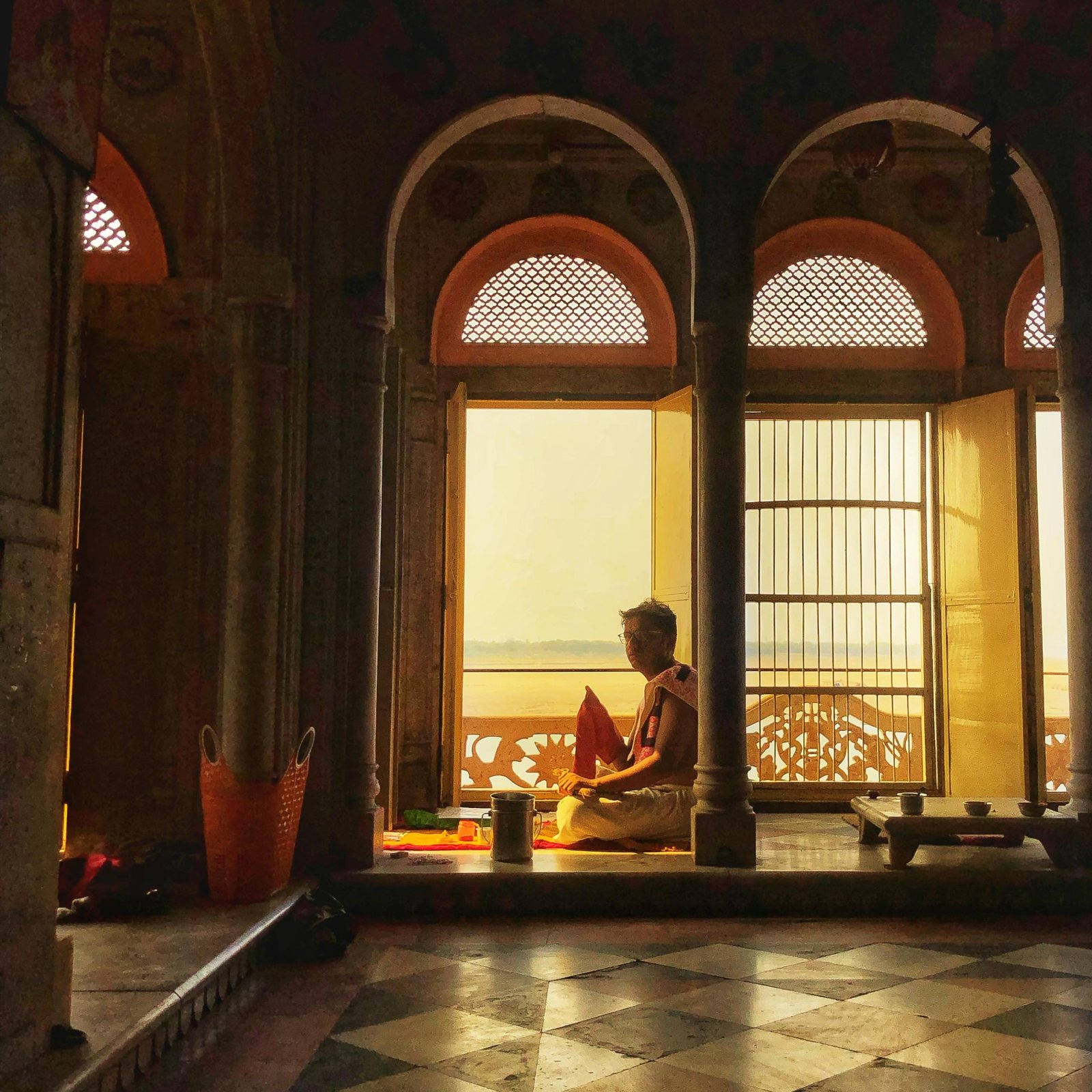 Lamp-lit temple corridor atmosphere