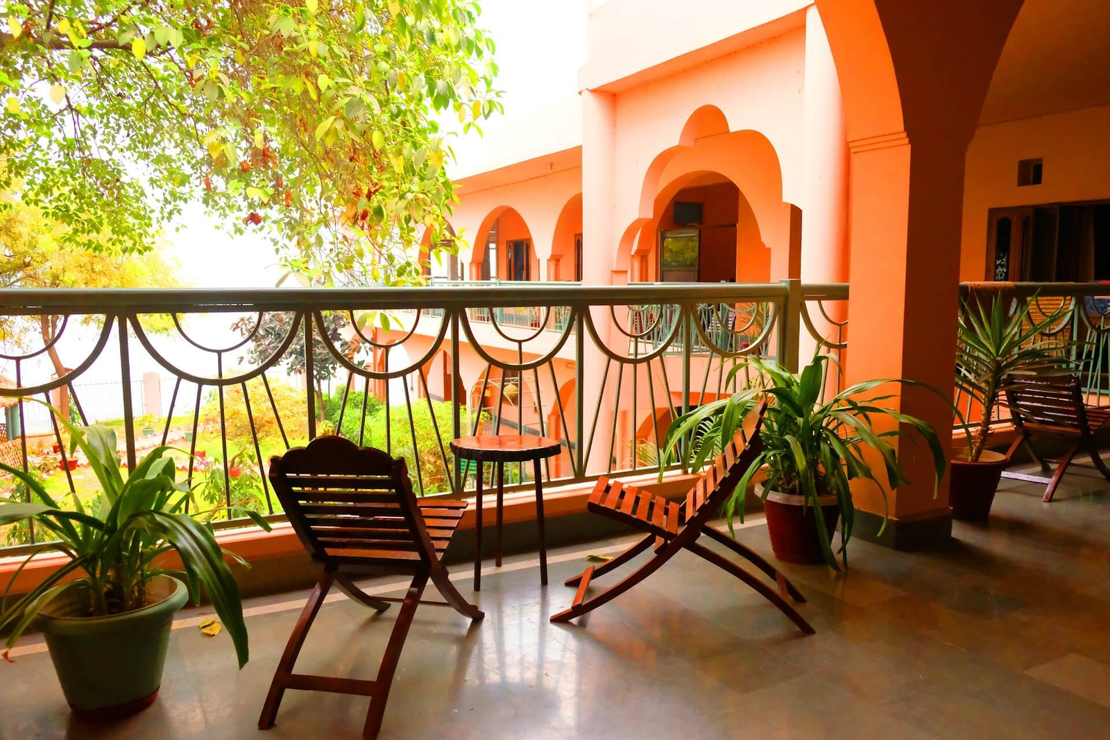 Arched courtyard and rooms at Aghor Ashram